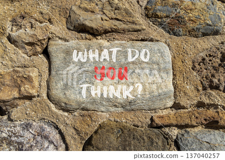 Support, help what do you think symbol. Concept words What do you think on beautiful grey stone. Beautiful stone wall background. Business what do you think concept. Copy space. Support, help what do you think symbol. Concept words What do you think on beautiful grey stone. Beautiful stone wall background. Business what do you think concept. Copy space. 137040257