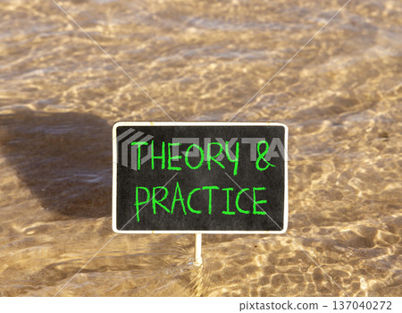Theory and practice symbol. Concept words Theory and practice on beautiful black blackboard. Beautiful Red sea water background. Business theory and practice concept. Copy space. Theory and practice symbol. Concept words Theory and practice on beautiful black blackboard. Beautiful Red sea water background. Business theory and practice concept. Copy space. 137040272