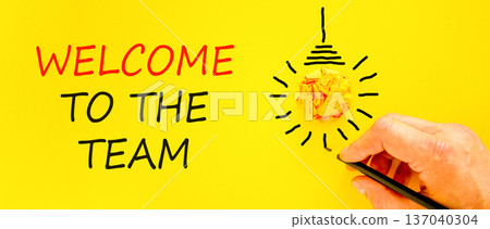 Support, help welcome to the team symbol. Concept words Welcome to the team on beautiful yellow paper. Beautiful yellow background. Businessman's hand. Business welcome to the team concept. Copy space Support, help welcome to the team symbol. Concept words Welcome to the team on beautiful yellow paper. Beautiful yellow background. Businessman's hand. Business welcome to the team concept. Copy space 137040304