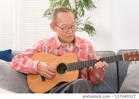 Senior man hobby guitar Senior man hobby guitar 137040527