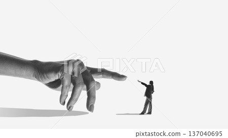 Symbolic design giant hand guiding miniature person direction. 137040695