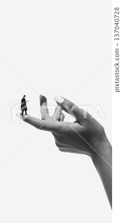 Surreal composition person standing on extended fingertip Surreal composition person standing on extended fingertip 137040728