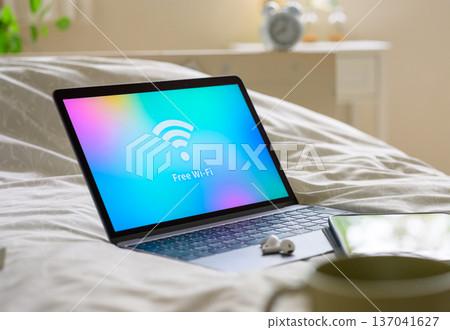Digital devices on the bed 137041627