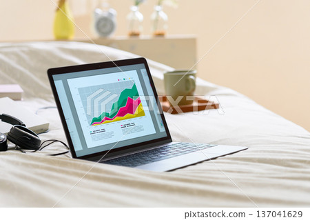 Working from home in bed 137041629