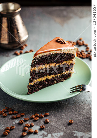 Chocolate coffee cake slice with frosting Chocolate coffee cake slice with frosting 137041657