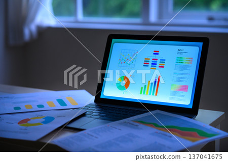 Laptop and graph analysis Laptop and graph analysis 137041675