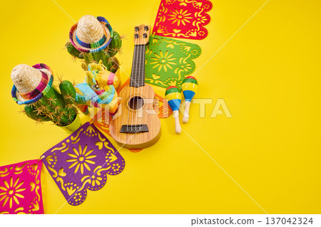 Mexican fiesta celebration with colorful cultural objects 137042324