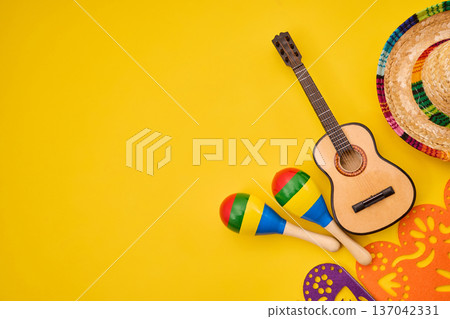 Mexican fiesta items on yellow background celebrating culture Mexican fiesta items on yellow background celebrating culture 137042331