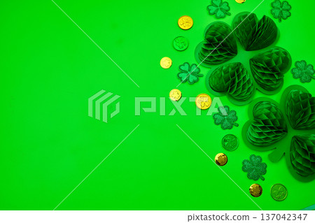 St. Patrick's day celebration with shamrocks and gold coins St. Patrick's day celebration with shamrocks and gold coins 137042347