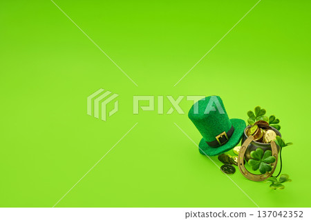 St. Patrick's day leprechaun hat and pot of gold symbolizing irish luck St. Patrick's day leprechaun hat and pot of gold symbolizing irish luck 137042352