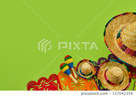Sombreros and maracas celebrating mexican fiesta culture Sombreros and maracas celebrating mexican fiesta culture 137042354