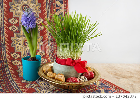 Nowruz haft-sin table celebrating persian new year 137042372