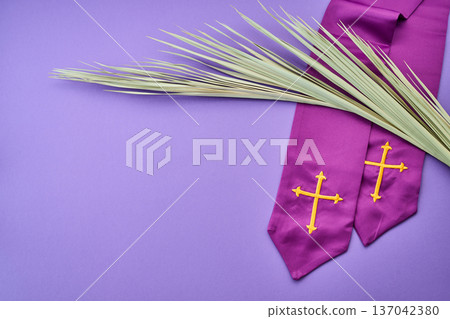 Purple stole and palm leaf for palm sunday Purple stole and palm leaf for palm sunday 137042380