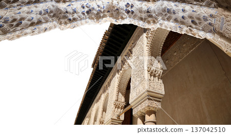 Arches in Islamic (Moorish) style (carved on white background) in Alhambra, Granada, Spain Arches in Islamic (Moorish) style (carved on white background) in Alhambra, Granada, Spain 137042510