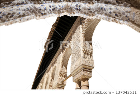 Arches in Islamic (Moorish) style (carved on white background) in Alhambra, Granada, Spain Arches in Islamic (Moorish) style (carved on white background) in Alhambra, Granada, Spain 137042511