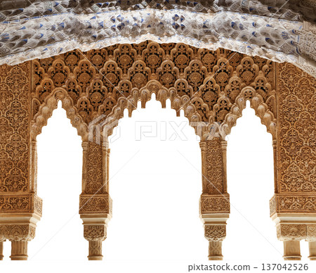 Arches in Islamic (Moorish) style (carved on white background) in Alhambra, Granada, Spain Arches in Islamic (Moorish) style (carved on white background) in Alhambra, Granada, Spain 137042526