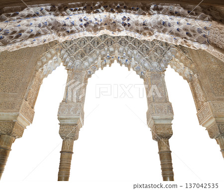 Arches in Islamic (Moorish) style (carved on white background) in Alhambra, Granada, Spain Arches in Islamic (Moorish) style (carved on white background) in Alhambra, Granada, Spain 137042535