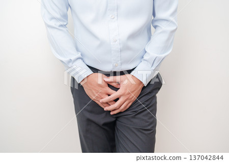 Older Man having Prostate gland or Urinary bladder pain. Prostate Cancer, Enlarged prostate, Prostatitis disease, Hypothyroidism, Male Infertility, Health and World cancer day concept 137042844