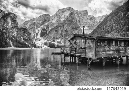 Wooden boat house on the scenic Lake Braies, Dolomites, Italy 137042939
