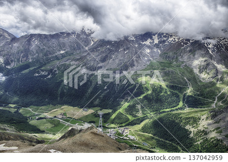 Ascending Schnalstal Glacier by cable car in the Italian Alps 137042959