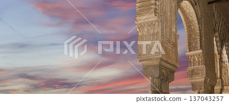 Arches in Islamic (Moorish) style (against the sunset) in Alhambra, Granada, Spain Arches in Islamic (Moorish) style (against the sunset) in Alhambra, Granada, Spain 137043257
