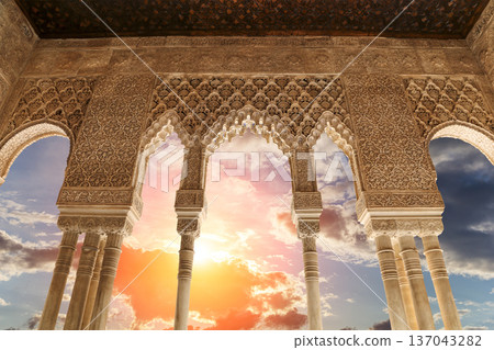 Arches in Islamic (Moorish) style (against the sunset) in Alhambra, Granada, Spain Arches in Islamic (Moorish) style (against the sunset) in Alhambra, Granada, Spain 137043282