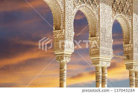 Arches in Islamic (Moorish) style (against the sunset) in Alhambra, Granada, Spain Arches in Islamic (Moorish) style (against the sunset) in Alhambra, Granada, Spain 137043284