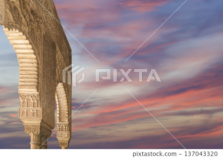 Arches in Islamic (Moorish) style (against the sunset) in Alhambra, Granada, Spain Arches in Islamic (Moorish) style (against the sunset) in Alhambra, Granada, Spain 137043320