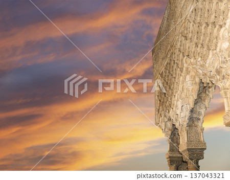 Arches in Islamic (Moorish) style (against the sunset) in Alhambra, Granada, Spain Arches in Islamic (Moorish) style (against the sunset) in Alhambra, Granada, Spain 137043321
