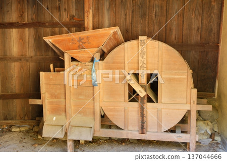 A winnowing machine, a farming tool used by farmers in the past 137044666