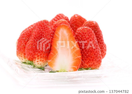 Strawberry Benihoppe cut cross section bright background Strawberry Benihoppe cut cross section bright background 137044782