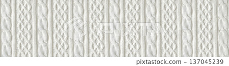 Seamless White Knitted Wool Texture with Elegant Cable Stitch Pattern for Winter Fashion Background Seamless White Knitted Wool Texture with Elegant Cable Stitch Pattern for Winter Fashion Background 137045239