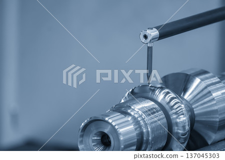 Quality inspection of an automotive component's surface roughness (Ra/Rz) using a high precision digital profilometer in a laboratory setting. 137045303