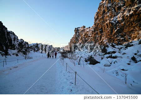 Walking through the Gjao crack in the earth_Iceland 137045500