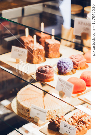 Close-Up of Desserts Display with Price Tags  137045530