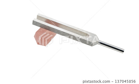 Rose quartz and crystal tuner, tuning fork and natural stone macro material Rose quartz and crystal tuner, tuning fork and natural stone macro material 137045856