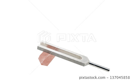 Rose quartz and crystal tuner, tuning fork and natural stone macro material 137045858