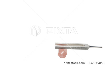 Rose quartz and crystal tuner, tuning fork and natural stone macro material 137045859