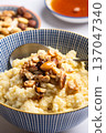 Millet porridge with mixed nuts 137047340
