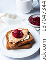 Open sandwich from leftover turkey and cranberry sauce 137047344