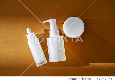 White cosmetic bottles and jar for skincare routine White cosmetic bottles and jar for skincare routine 137047963