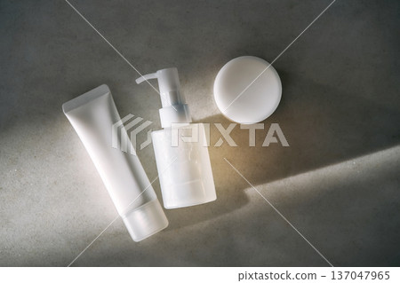 Skincare products, pump bottle, tube, and cream jar 137047965