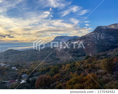 Mountain village in autumn under a blue sky 137048482
