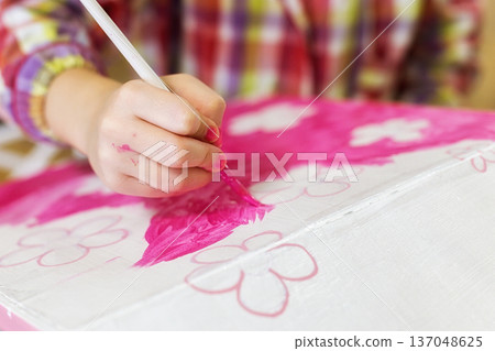 children's hands draw a house for dolls. child creativity Place for text 137048625