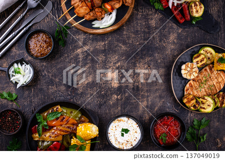 Assortment of grilled bbq meat and vegetables 137049019