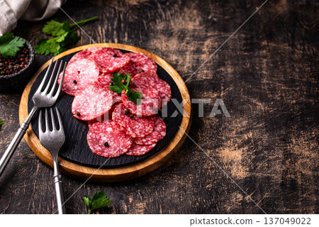 Sliced spicy tasty salami sausage 137049022