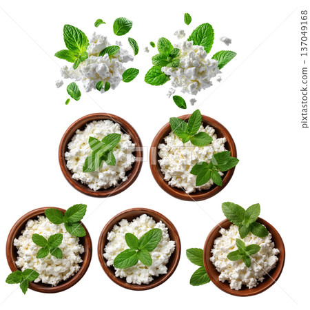 Fresh cottage cheese in wooden bowl garnished with green mint leaves, isolated on white transparent background Fresh cottage cheese in wooden bowl garnished with green mint leaves, isolated on white transparent background 137049168