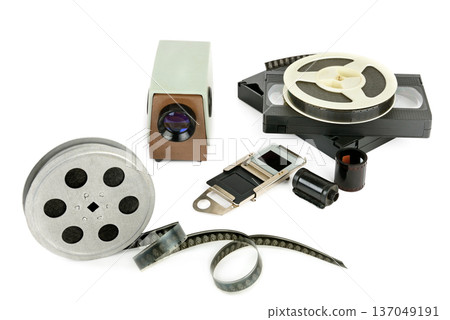 Vintage Media Collection with Film Reels and Projector Vintage Media Collection with Film Reels and Projector 137049191