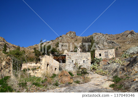 A village on the mountain slope A village on the mountain slope 137049346
