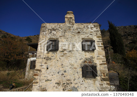 A village on the mountain slope A village on the mountain slope 137049348